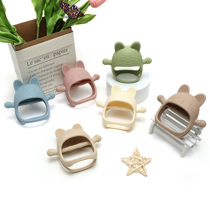 Baby Bubble silicone glove teether with textured surface for soothing relief, designed for babies to chew and soothe gums.