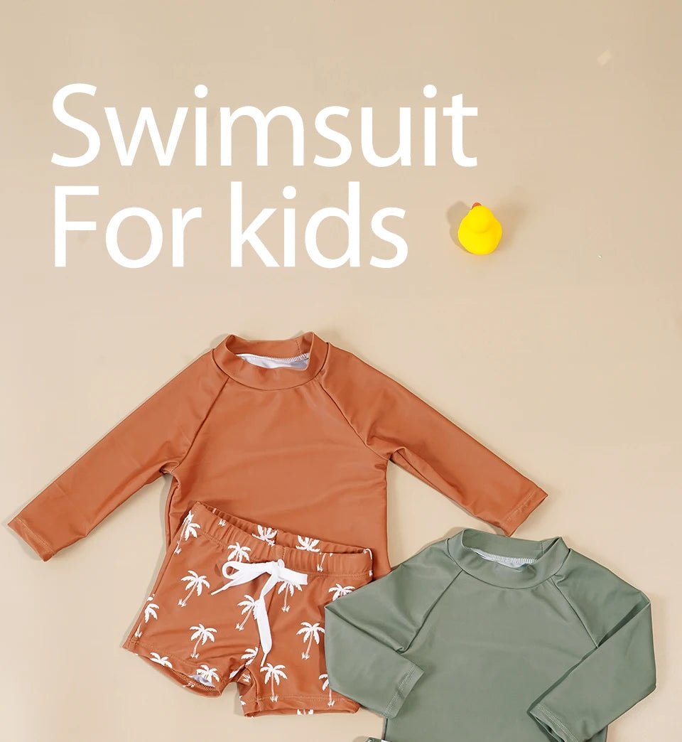 Baby Boy's 2-piece swimsuit set with cool print by Baby Bubble, featuring colorful swim trunks and matching rash guard.