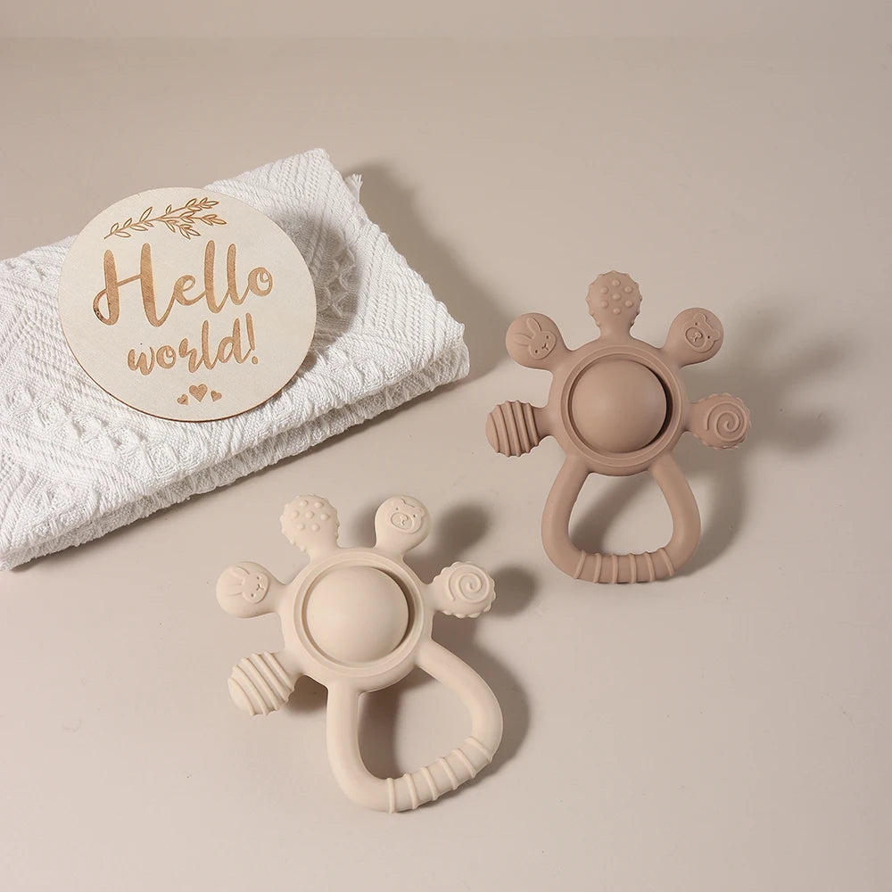 Baby Bunny Palm Rattle Teether by Baby Bubble, soft baby chew toy with bunny shape and textured surface for soothing teething relief.