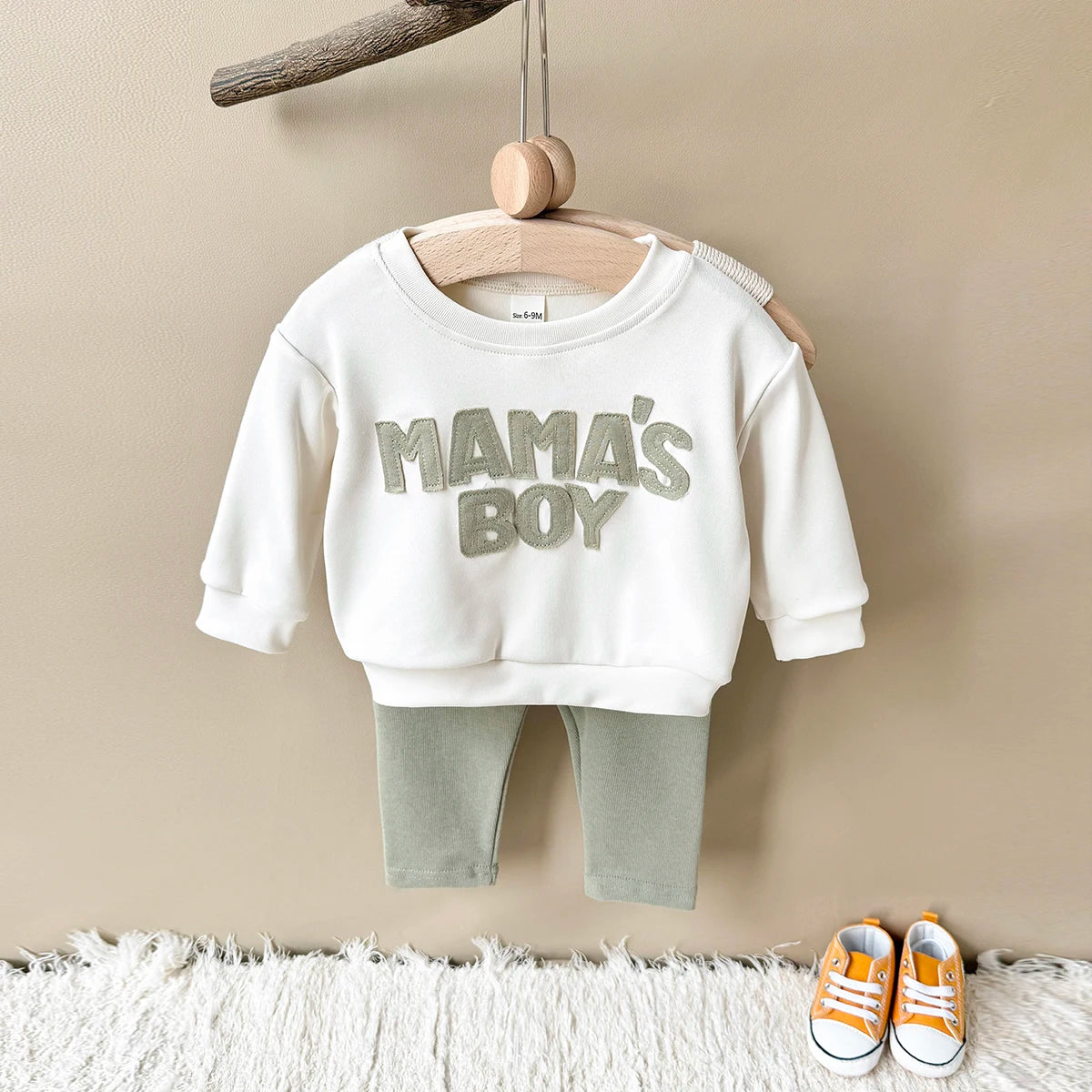 Baby Bubble MAMA'S BOY graphic sweatshirt set for babies, featuring a cozy sweatshirt and matching pants in soft, warm fabric.